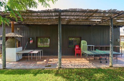 La Carlota House | La Cabaña piscina y jardín