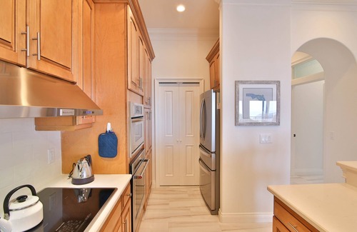 Holmes Beach Condo | La Casa Costiera Blue Water - Newly Renovated, Top Floor Beachfront Condo