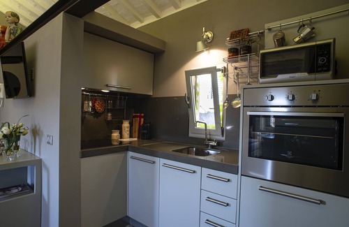 Lajatico Apartment | La Casetta di Borgo, L'Albero. Modern attic with view on hills and village