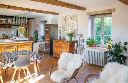 Saint-Galmier Bed & Breakfast | La Fée Capucine - Chambres et table d'hôtes - Espace bien-être et massages