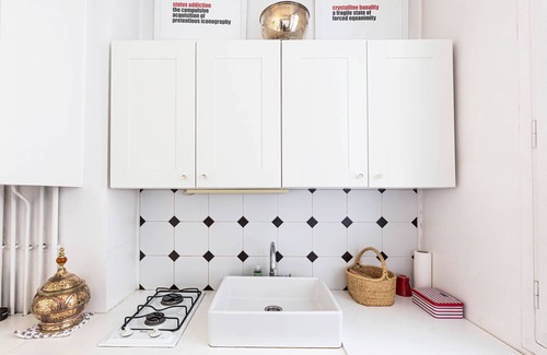 Saint-Vincent-de-Paul Apartment | La Fayette Light, by Veeve