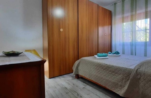 Carbonia House | La Pergola