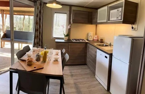 Daglan Ski Chalet | La Peyrugue Campsite * - Chalet RÊVE +: air conditioning - dishwasher - 2 bedrooms - 2 Chilean deckchairs - Covered terrace for 5 people