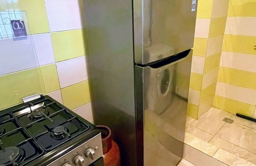 Angre Apartment | La Siesta Abidjan-Charming 2-bedroom Split-Mezzanine level apartment; WiFi-AC.