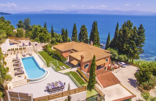 Dafnata Villa | "LA VISTA E BELLA" SEAFRONT PRIVATE RESORT NEAR ACHILLEION PALACE ESTATE