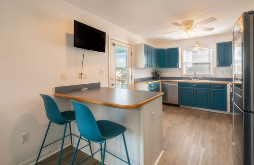 Nags Head House | Lagoon Escape - Canal Front, Hot Tub, Community Pool, Pet Friendly!