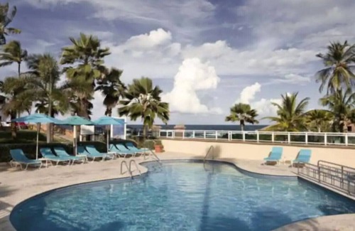 Puerta de Tierra Apartment | Lagoon View Studio | Balcony, Pool & Hot Tub