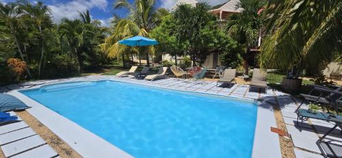Tamarin Apartment | LAKAZ DEL SOL - Modern and elegant apartments with luxurious garden, pool and barbecue area - Tourism Permit Certified