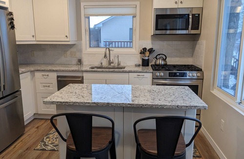 Lake Ann Cottage | Lake Ann, MI cozy waterfront cottage, newly remodeled with private beach & dock