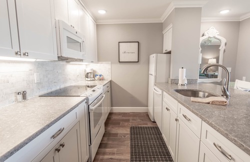 Boyne City Condo | Lake Charlevoix Views | Private Patio | Steps to Sand & Shoreline |