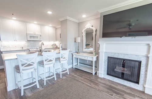 Boyne City Condo | Lake Charlevoix Views | Private Patio | Steps to Sand & Shoreline |