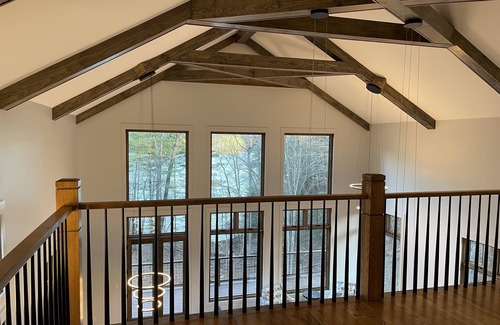 Nebo House | Lake front home with dock in a small cove with a beach.