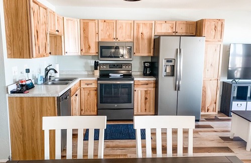Shawano House | Lake front house for rent with dock and boat.