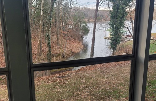 Wolf Creek House | Lake Front. Large shaded deck with Covered Dock access. Fire pit.