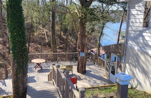 Wolf Creek House | Lake Front. Large shaded deck with Covered Dock access. Fire pit.