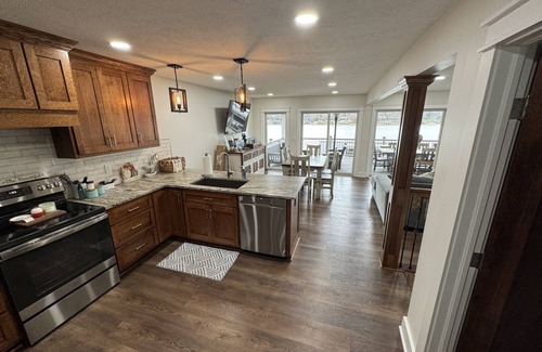 Howard House | Lake Front Paradise-Dock, Deck, Hot Tub, Lake & Sunrises-