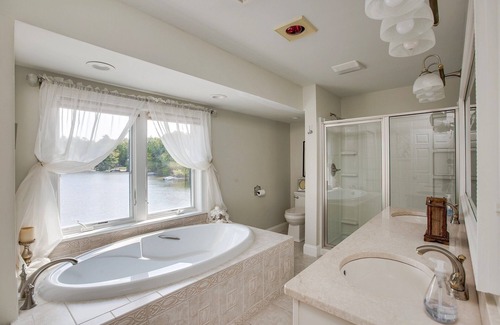 The Bays House | LAKE-FRONT! Your own PRIVATE BEACH & DOCK on PRIVATE Peninsula