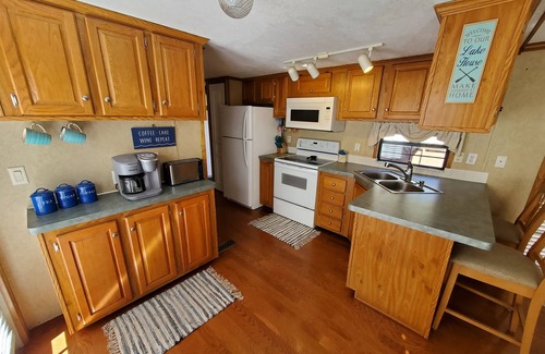 Salt Springs Cabin | Lake Kerr Cabin in Salt Springs W/golf cart and water sports equipment.