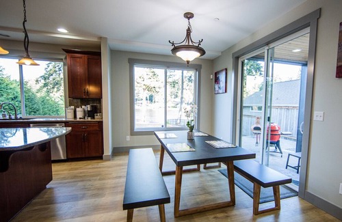 Lakeland South House | Lake Killarney Waterfront Craftsman Style House.