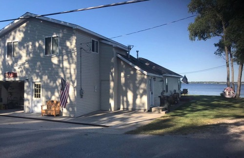 Cadillac House | Lake Mitchell Lakefront Rental, very sandy lakefront. great ice fishing lake