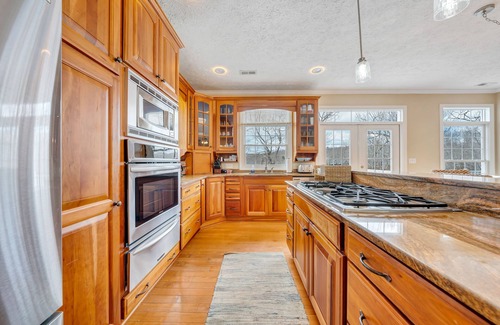 Westlake Corner House | LAKE Royale: Lakefront Home with hot tub.