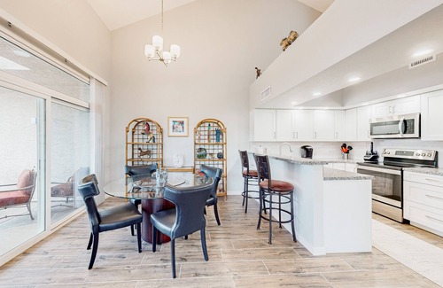 Townhomes On Coral Reef House | Lake view desert stay with pool, patio, grill, & smart TVs - snowbird-friendly
