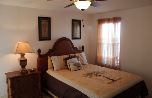 Loughman House | Lake view, hot tub, free Wi-Fi, 6 TVs, game room, gated community, club house