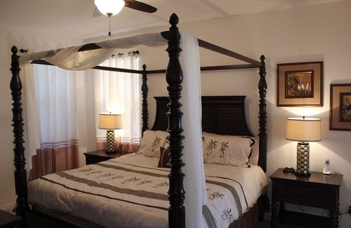 Loughman House | Lake view, hot tub, free Wi-Fi, 6 TVs, game room, gated community, club house