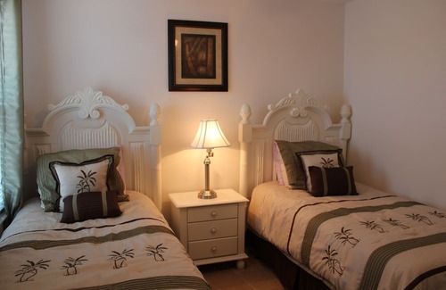 Loughman House | Lake view, hot tub, free Wi-Fi, 6 TVs, game room, gated community, club house