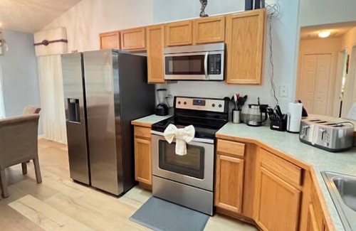 Crescent Lakes House | Lake View - South Facing Pool & Spa - Game Room - Nr Disney - Quiet Community