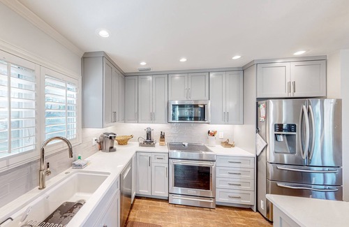 Miramar Beach House | Lake-view with private dock, pools, 6-seat golf cart, grill, patio & BBQ
