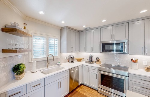 Miramar Beach House | Lake-view with private dock, pools, 6-seat golf cart, grill, patio & BBQ