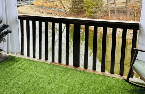 Lake Ozark Apartment | Lakefront Relaxing stay with boat ramp, slip, indoor, outdoor pool and hot tub