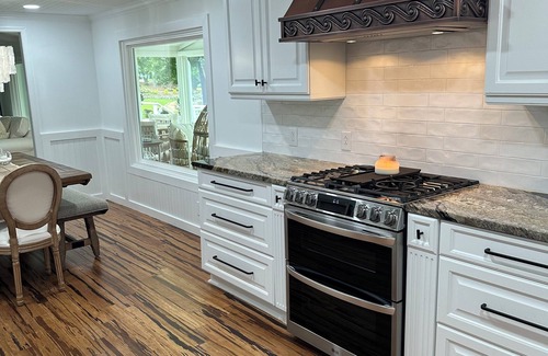 Terrell Cottage | LAKEFRONT GARDEN COTTAGE- beach, screened porch, dock, private, amazing views