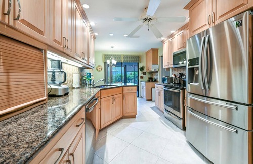 Pelican Bay House | Lakefront 3 bedroom, 2 bath home in gated community. Walking distance to beach.