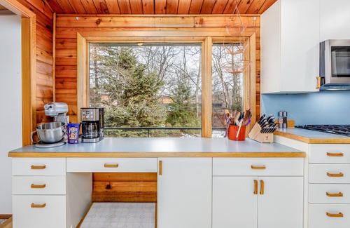 Sand Lake House | Lakefront Anchorage home with fireplaces, jetted tub & private dock