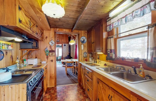 Greenville House | Lakefront cabin with private boat ramp, lake access, wrap-around porch, firepit