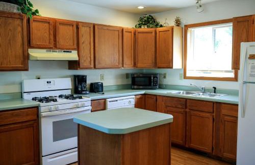 Tomah House | Lakefront Cabin Rental with a Paddle Boat near Wisconsin Dells, Wisconsin