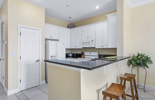 Palm Coast Condo | Lakefront Condo with Balcony Dining, Heated Pools, Beach Access