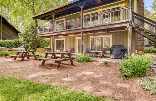 Troutman House | Lakefront Cottage located in a quiet cove with a fire-pit, kayaks & paddle board