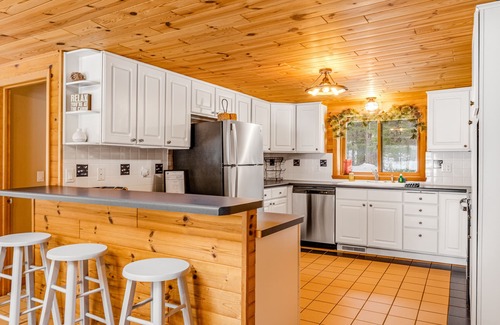Eagle River House | Lakefront, dog-friendly home with dock, kayaks, deck, & washer/dryer