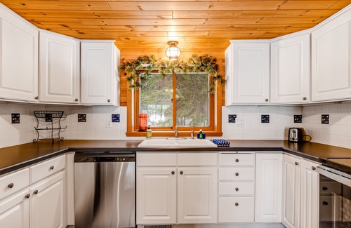 Eagle River House | Lakefront, dog-friendly home with dock, kayaks, deck, & washer/dryer