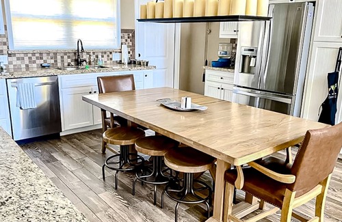 Pointblank House | Lakefront dog-friendly home with alfresco dining, balcony, & fireplace