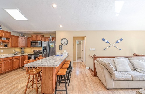 Bumpass House | Lakefront family home in gated community with swimming area & dock - dogs OK
