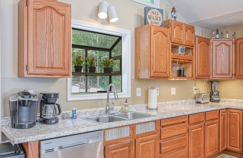 Bumpass House | Lakefront family home in gated community with swimming area & dock - dogs OK