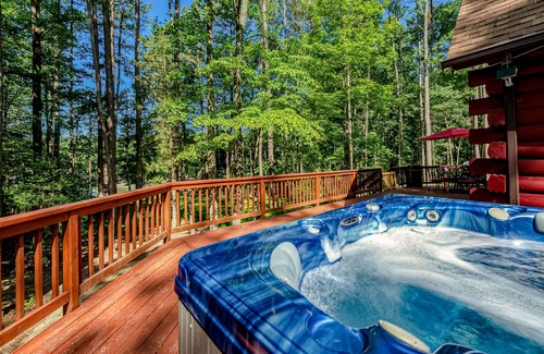 Bumpass House | Lakefront home with boat mooring, deck, hot tub, game room & fast WiFi - dogs OK