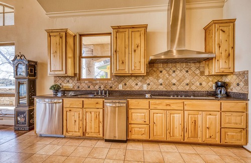 Kingsland House | Lakefront home with patio, grill, lake views, office, lake access & washer/dryer