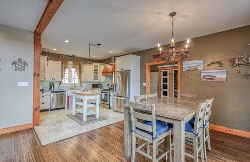 Bumpass House | Lakefront home with private hot tub, dock, grill, game room, lake views & kayaks