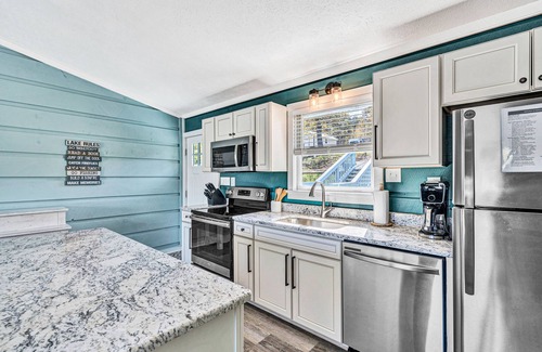 Huddleston House | Lakefront home with private dock, hot tub, kayaks & paddle board - dog-friendly