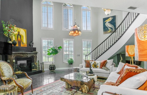 Palm Coast House | Lakefront house with lanai, beautiful courtyard & fishing lake